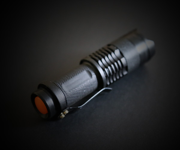 compact ultraviolet flashlight for viewing security features